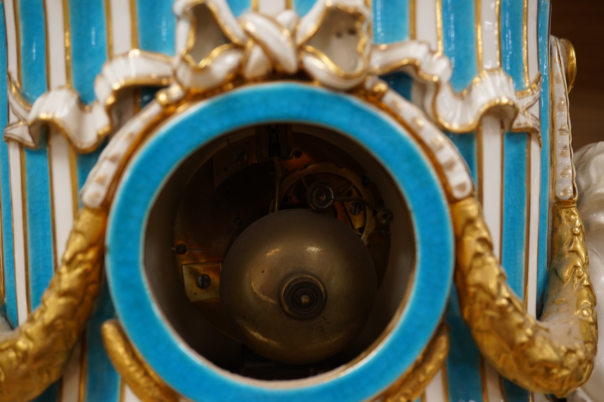 A 19th-century Sevres style porcelain mantel clock, 29cm tall